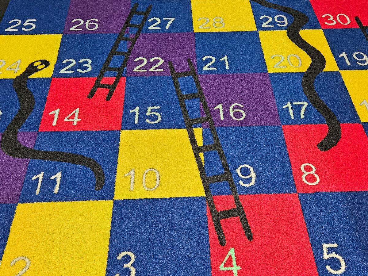 Enviro Surface Solutions snakes and ladders custom-made surfacing